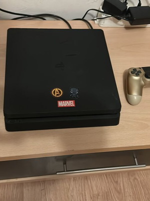 PlayStation 4 Slim console like new with 2 controllers and 3 games