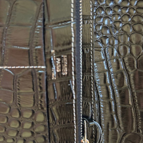 Large black leather Dogon-style wallet with strap and croco texture