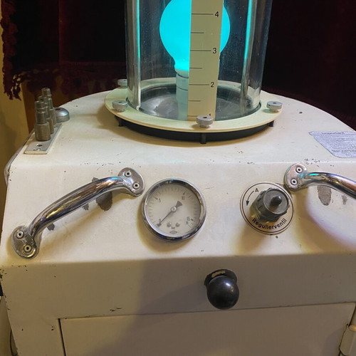 Vintage car oil change pump, decorative with lamp