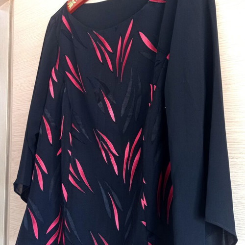 Black blouse with unique fuchsia satin details, like new, size 50