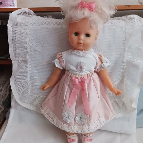 Vintage doll with handmade clothes like new