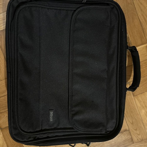 Black laptop bag with shoulder strap and pockets