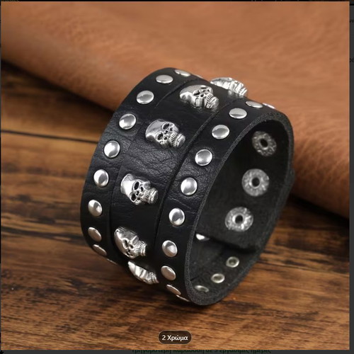 Leather bracelet new with studs and skulls black