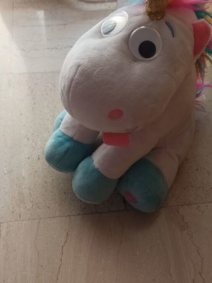 Unicorn plush toy lightly used