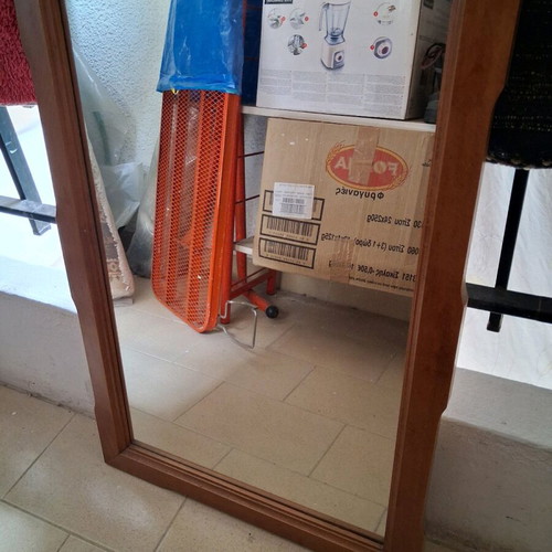 Mirror with wooden frame in very good condition