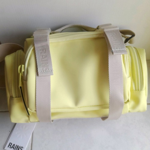 Rains shoulder bag, beige and yellow, waterproof fabric