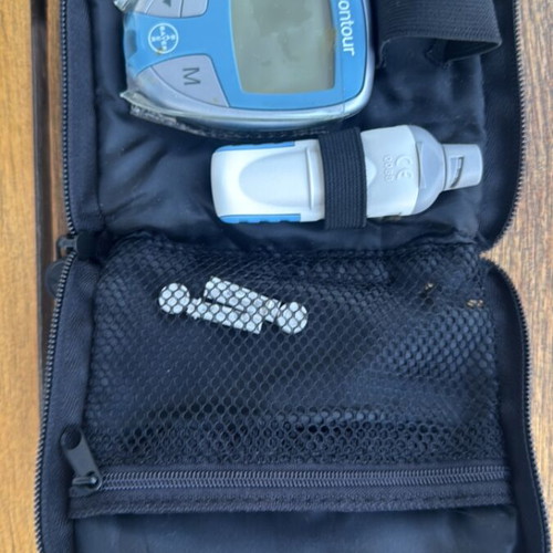 Contour glucose meter set like new with lancing device and case