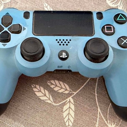 Sony DualShock 4 Uncharted 4 Limited Edition wireless controller used, grey blue