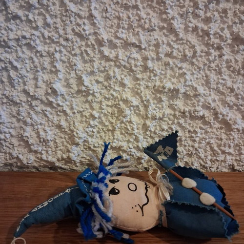 Vintage New Democracy Collectible Doll like new with historic torch emblem