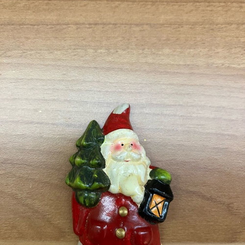 Santa Claus Christmas decoration set with bells and berries