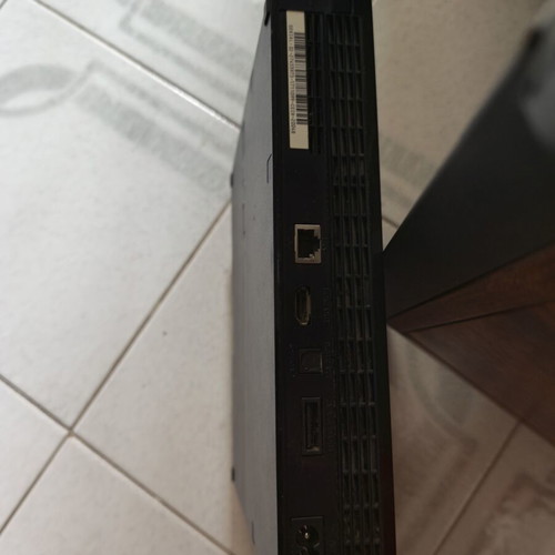 Sony PlayStation 3 Slim console like new with 2 games and cables