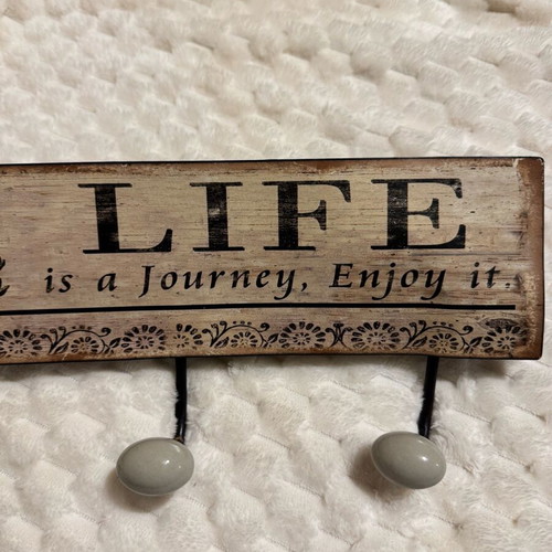 Wall hook like new with Life is a journey, enjoy it inscription
