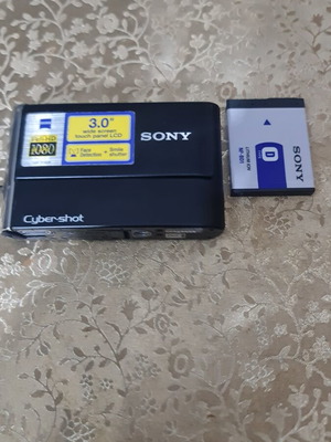 Sony Cyber-shot TSC-T70 camera with battery and accessories