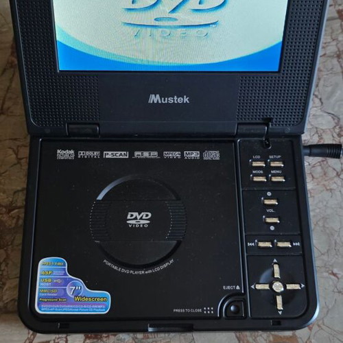 Mustek portable DVD player used for spare parts with remote and charger