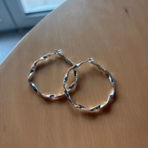 Silver earrings new, silver color