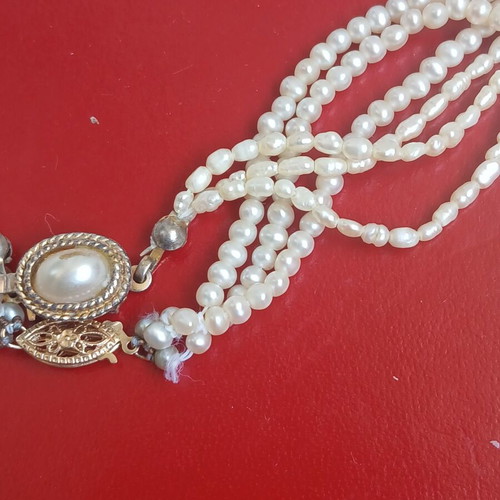 Two freshwater pearl necklaces with gold and metal clasps
