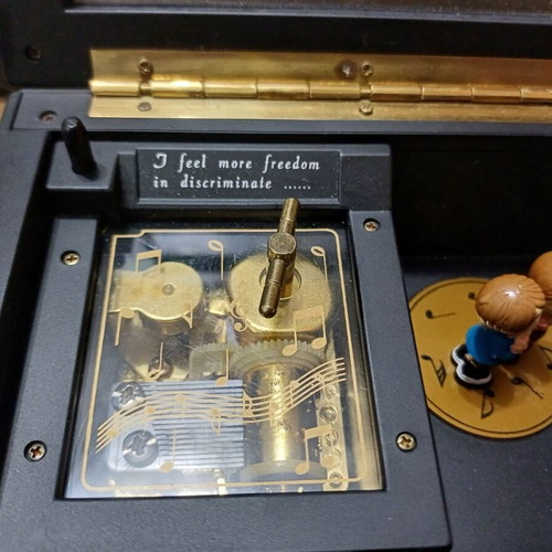 Piano music box used with compartments for small jewelry plastic
