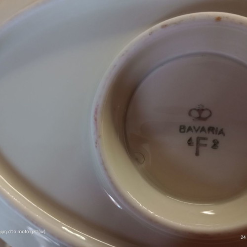 Gravy boat and deep plate used with floral patterns
