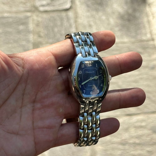 Christian D. Quartz watch with blue dial and metal bracelet