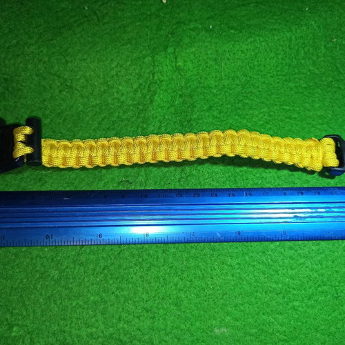 Paracord bracelet survival with cord, whistle and fire starter