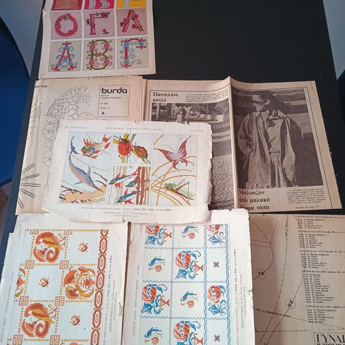 DMC and Burda embroidery patterns used, assorted