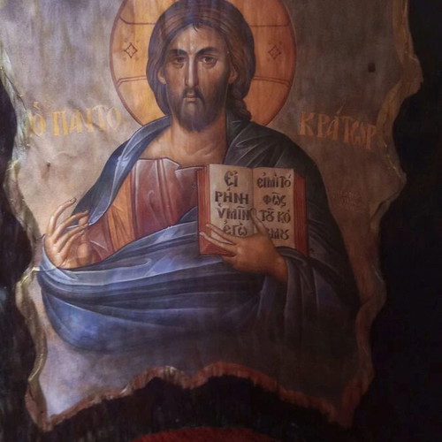 Christ image on tree trunk like new