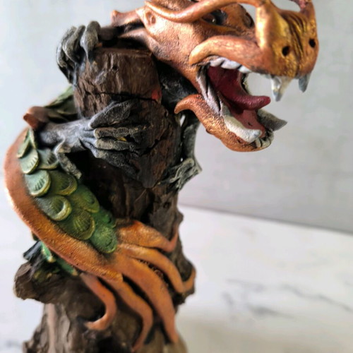 Wooden dragon handmade used with painted details