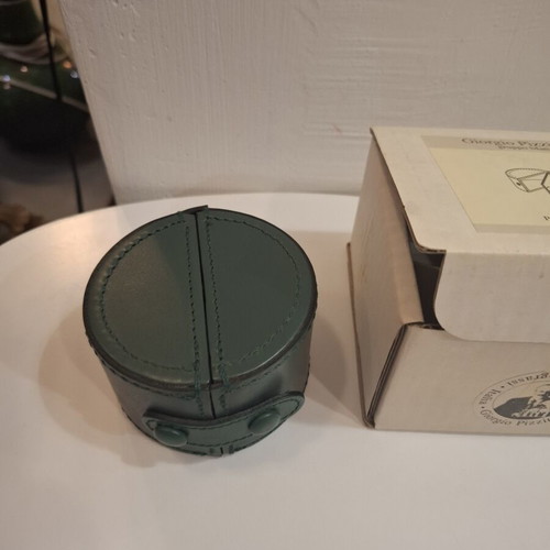 Cylindrical leather vintage travel case with small clock by Giorgio Pizzitutti