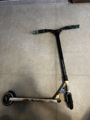 Scouter Envy scooter used with new handles, wheels, and grip tape