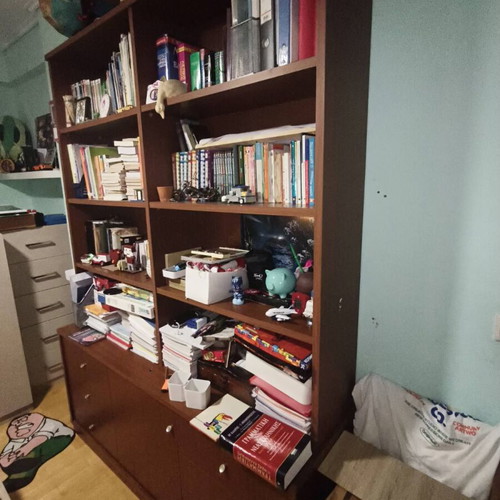 Bookcase like new with storage drawers and cabinets