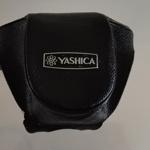 Yashica GSN Electro 35 camera used with Yashinon DX 45mm f/1.7 lens, case, and 2 flashes
