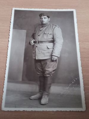 Military photos used, two large, old