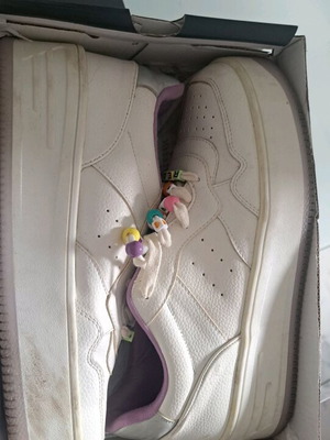 Athletic shoes new, white with playful laces size 38