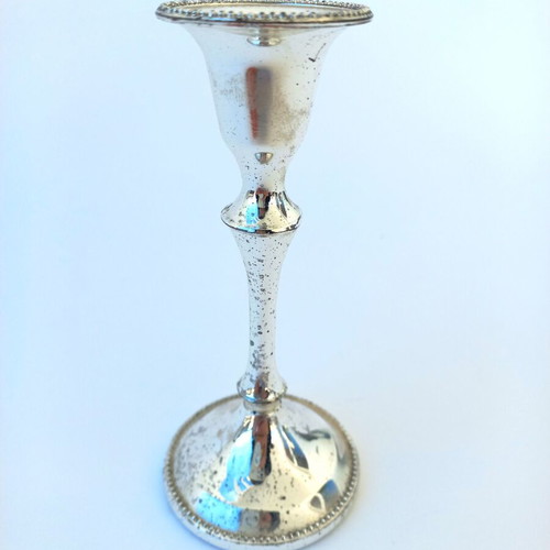 Old small silver-plated candlestick used