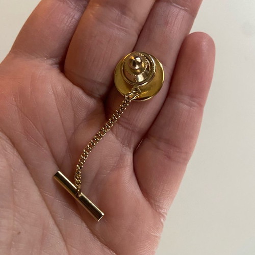 Vintage tie pin with letter E used