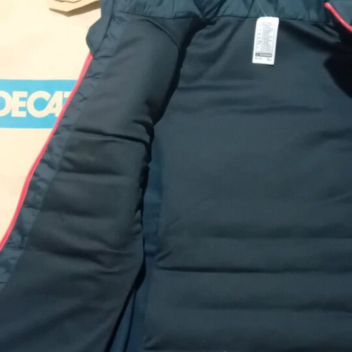 Sleeveless jacket new blue with red size 8-9 years