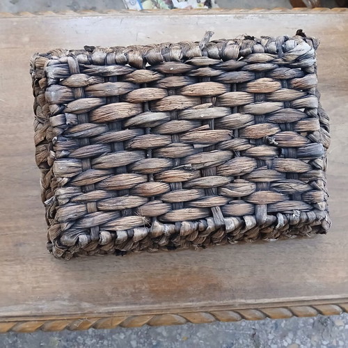 Woven decorative basket with metal handles like new
