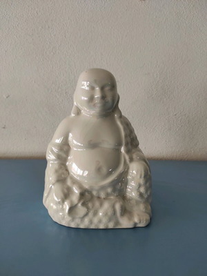 Vintage Buddha porcelain statue used