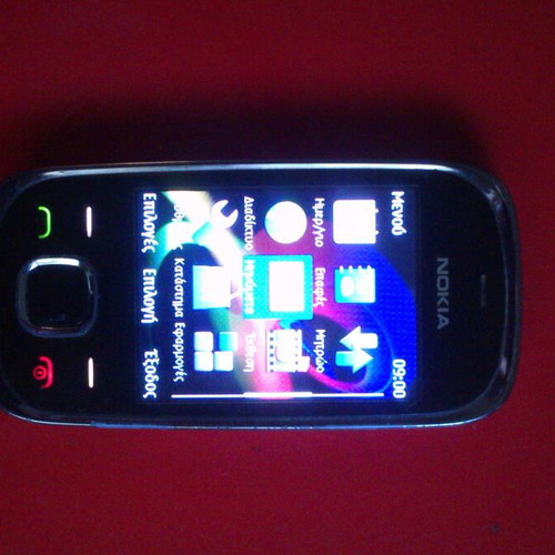 Nokia 7230 used for spare parts with original charger