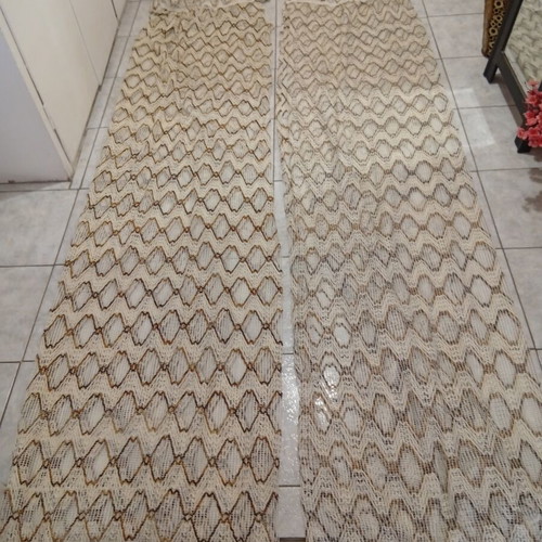 Pair of beige and brown curtains with ruffles, heavy knit