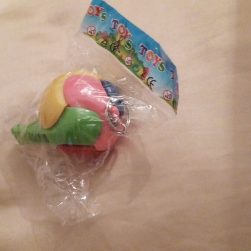 Collectible whistle ball keychain from the 80s, new