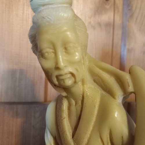 Samurai and Geisha vintage resin figurines in faux ivory