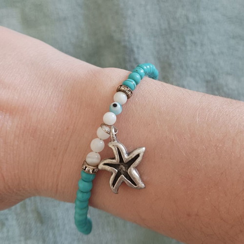 Bracelet with turquoise and white beads, silver details, new