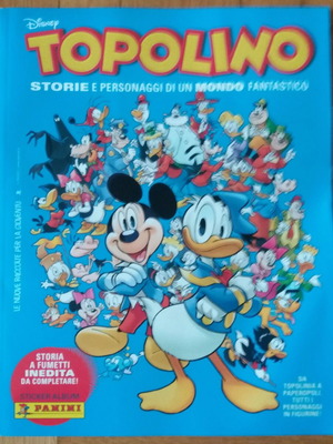 Mickey y Donald: Un Mundo Fantástico album like new with stickers and cards