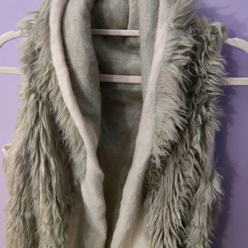Asymmetric fur vest used, beige and sugar shades