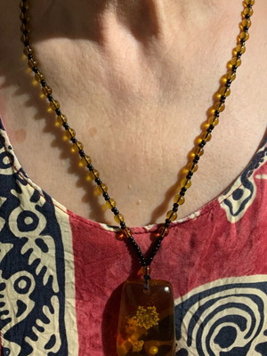 Amber pendant new, brown and golden