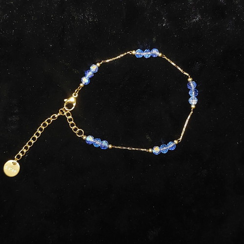 Stainless steel bracelet new, golden with light blue beads