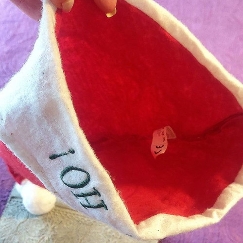 Santa Claus hat with gold glitter