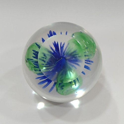 Vintage handmade art glass paperweight with blue flower