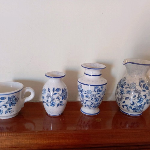 Handmade clay decorations jug, two vases and cup